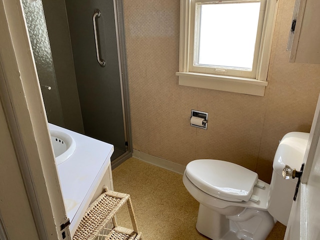 full bath with toilet, a stall shower, vanity, electric panel, and baseboards