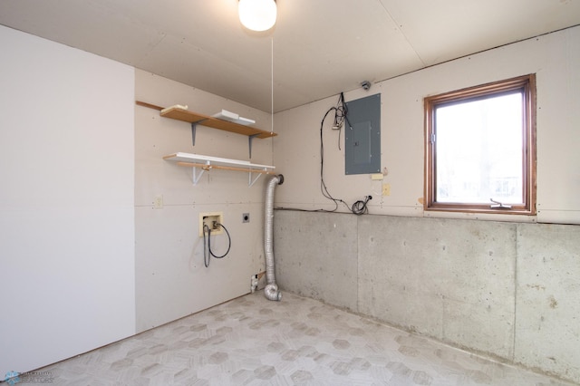 clothes washing area with electric panel, hookup for an electric dryer, hookup for a washing machine, and laundry area