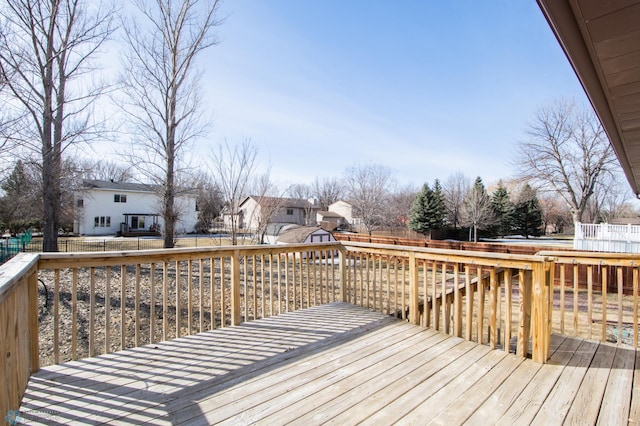 deck with a fenced backyard