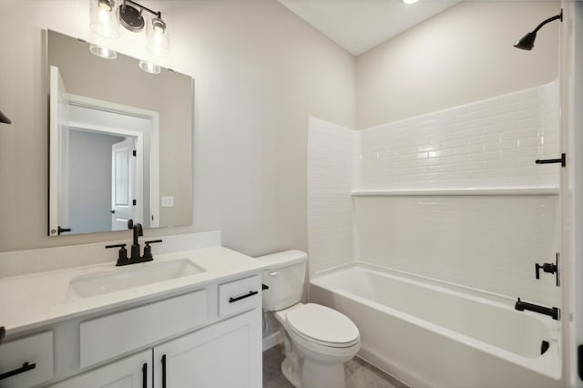 bathroom featuring bathtub / shower combination, vanity, and toilet