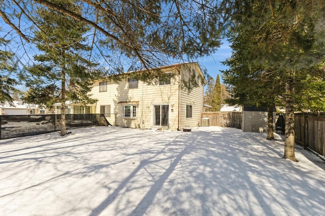 back of house featuring a fenced backyard