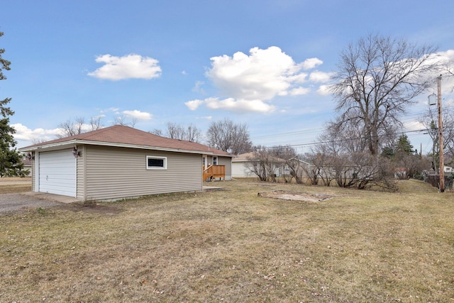 view of yard featuring a garage