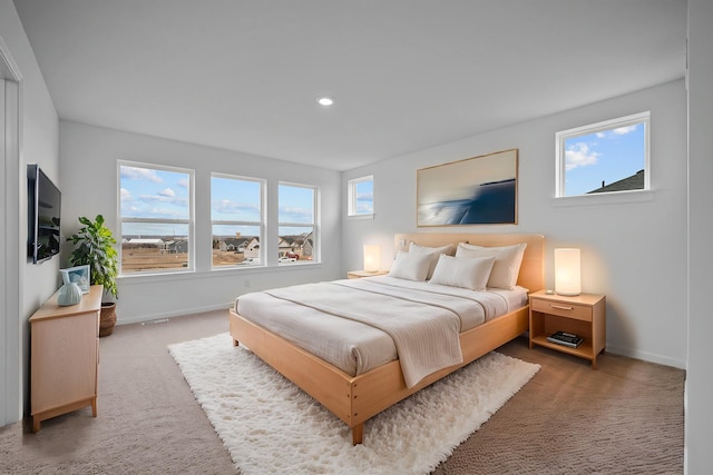 bedroom featuring visible vents, baseboards, carpet flooring, and recessed lighting