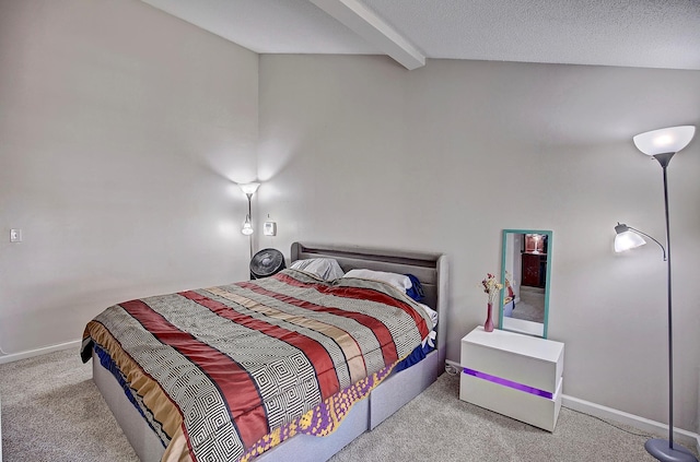 carpeted bedroom featuring lofted ceiling with beams, baseboards, and a textured ceiling