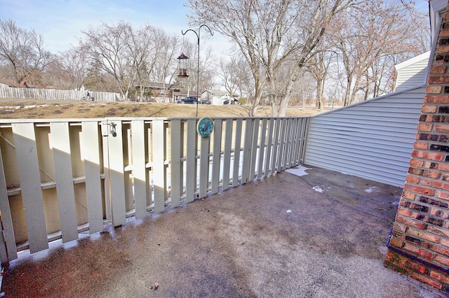 view of patio / terrace featuring fence