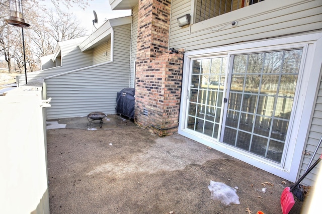 view of patio featuring a grill