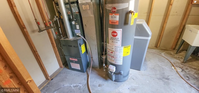 utility room featuring gas water heater