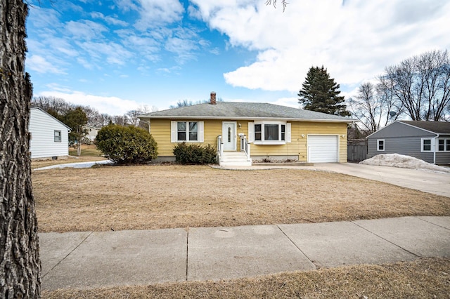 view of front of property with driveway, an attached garage, and a chimney