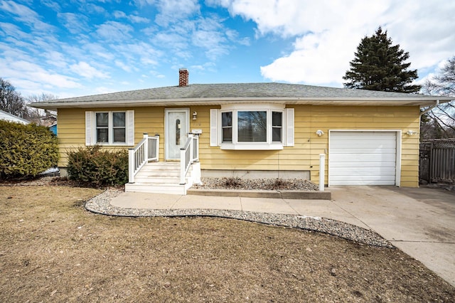 single story home with concrete driveway, a chimney, an attached garage, and fence