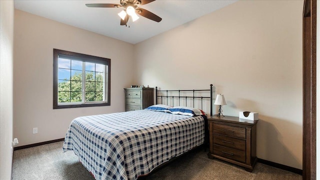 bedroom with carpet, a ceiling fan, and baseboards