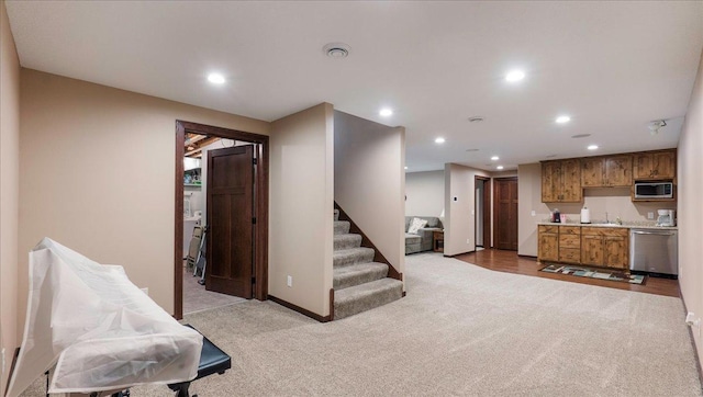 41032 Sauk Lake Rd, Sauk Centre, MN 56378 - interior space with recessed lighting, baseboards, a sink, and carpet