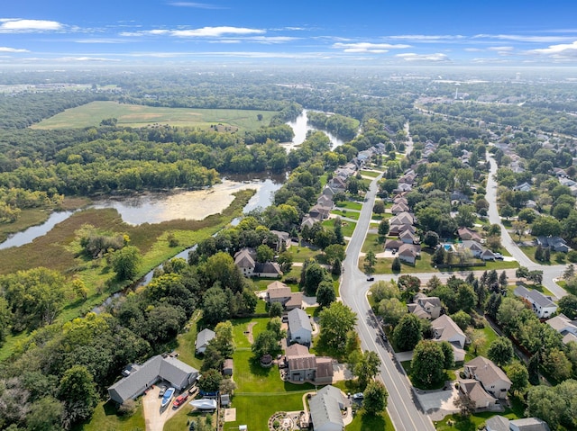 aerial view with a water view and a residential view