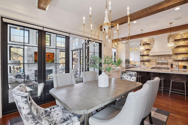 dining space featuring an inviting chandelier, beam ceiling, recessed lighting, and dark wood-style floors