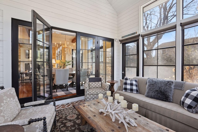 sunroom with lofted ceiling