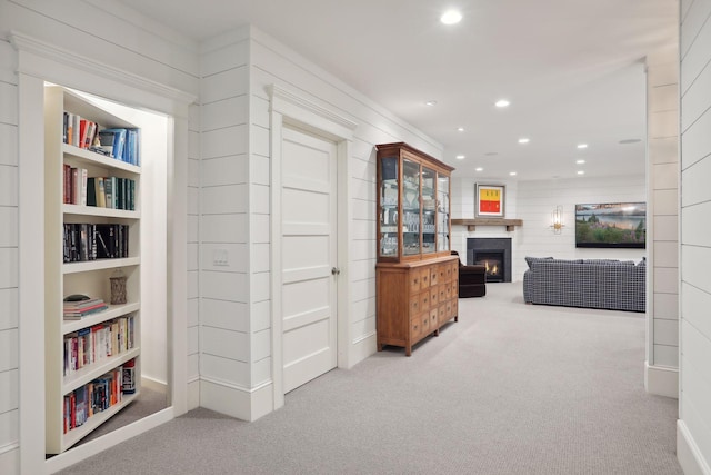 hallway featuring recessed lighting and carpet floors