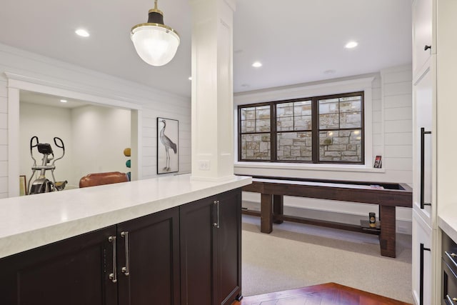 kitchen featuring light countertops, carpet flooring, and recessed lighting