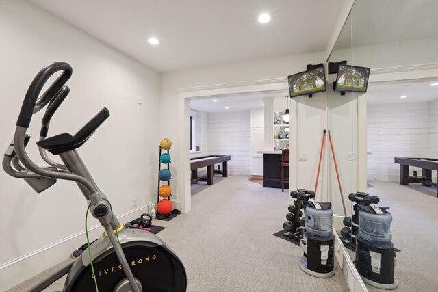 exercise area featuring recessed lighting and carpet floors