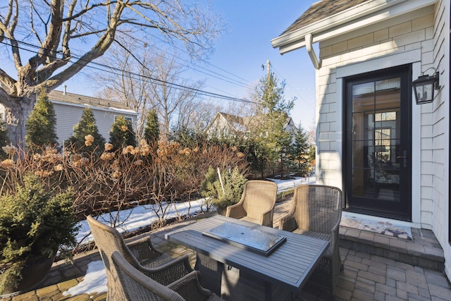 view of patio featuring outdoor dining area