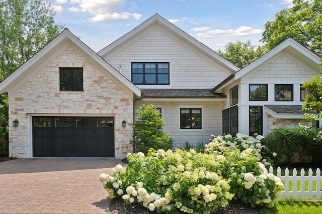 view of front of property with decorative driveway