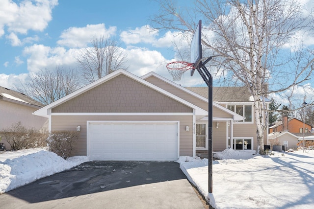 view of front facade featuring driveway and an attached garage