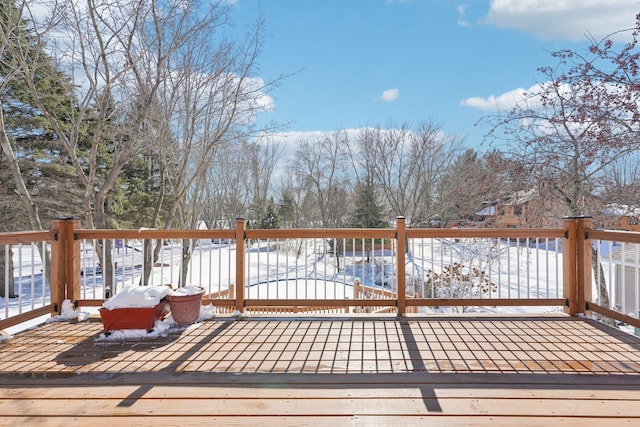 view of snow covered deck