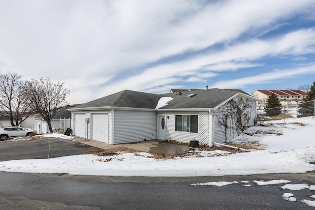 ranch-style house with a garage