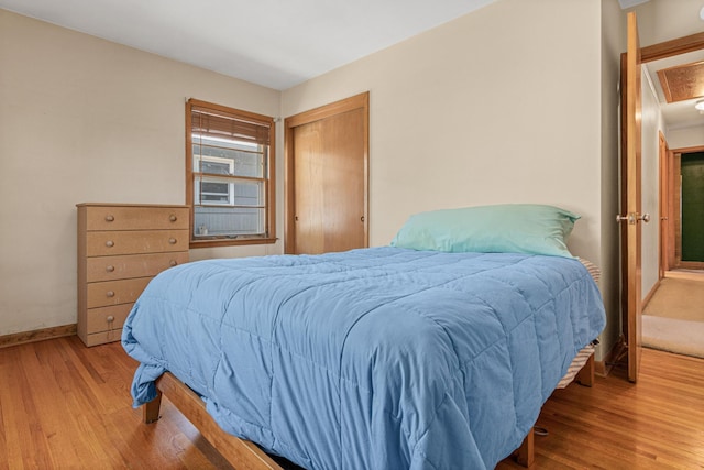1938 Sheridan Ave, Saint Paul, MN 55116 - bedroom featuring wood finished floors, baseboards, and a closet
