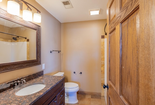 bathroom featuring vanity, visible vents, tile patterned flooring, a shower, and toilet