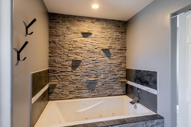 bathroom featuring a jetted tub