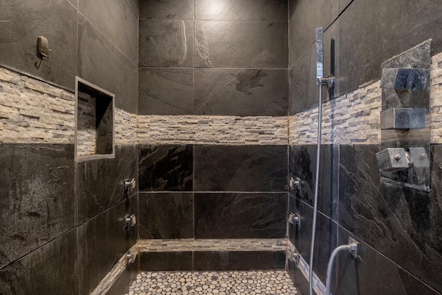 details with a tile shower