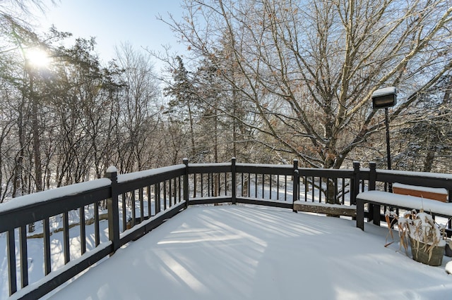 view of snow covered deck