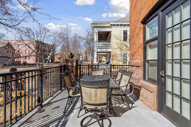 balcony featuring outdoor dining space