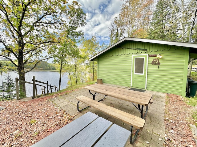 exterior space with a water view