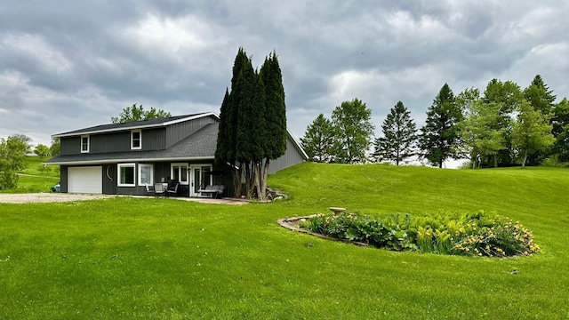 17170 Highview Ave, Minnewaska Twp, MN 56334 - view of grassy yard with an attached garage and driveway