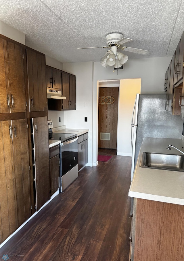 1110 3rd Ave N Unit 704E, Fargo, ND 58102 - kitchen featuring a sink, stainless steel electric range, a ceiling fan, light countertops, and under cabinet range hood