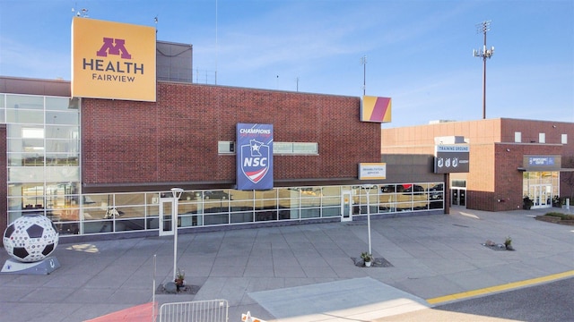 view of building exterior featuring fence