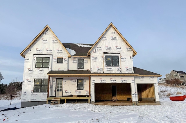 property in mid-construction featuring an attached garage