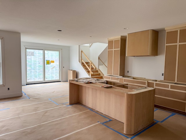 kitchen featuring modern cabinets and recessed lighting