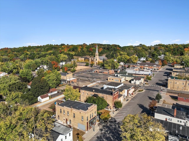 bird's eye view featuring a forest view