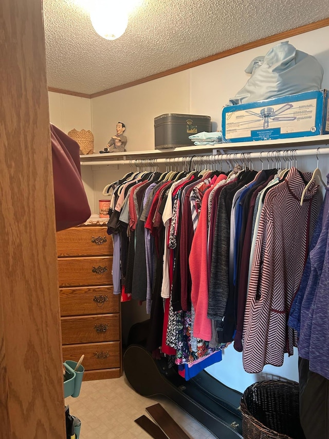 walk in closet featuring tile patterned floors