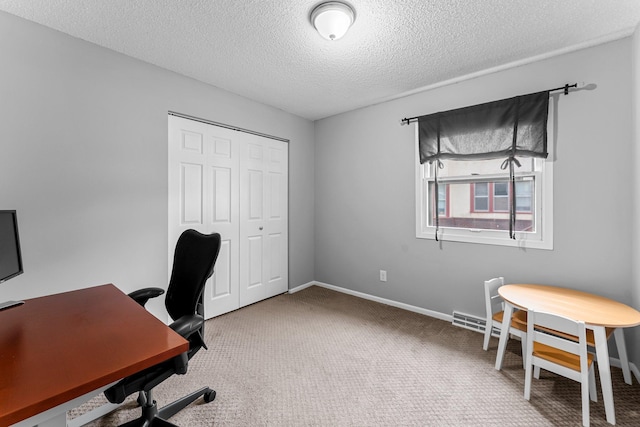 607 Adams St NE, Minneapolis, MN 55413 - carpeted office featuring a textured ceiling and baseboards