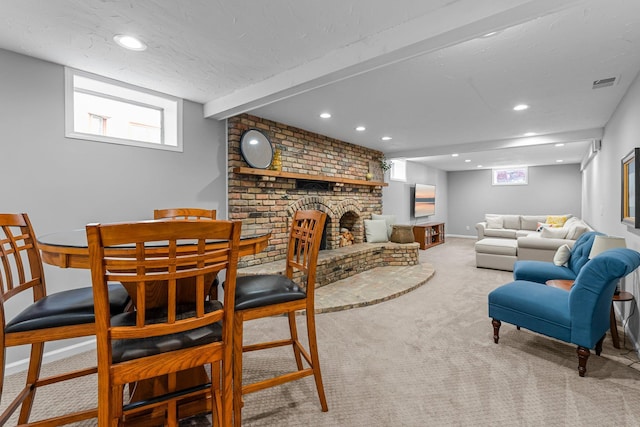 607 Adams St NE, Minneapolis, MN 55413 - living area featuring carpet floors, recessed lighting, a fireplace, and baseboards