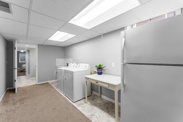 607 Adams St NE, Minneapolis, MN 55413 - laundry area with washing machine and dryer and baseboards