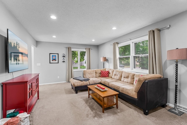 607 Adams St NE, Minneapolis, MN 55413 - living room featuring light colored carpet, recessed lighting, and a textured ceiling