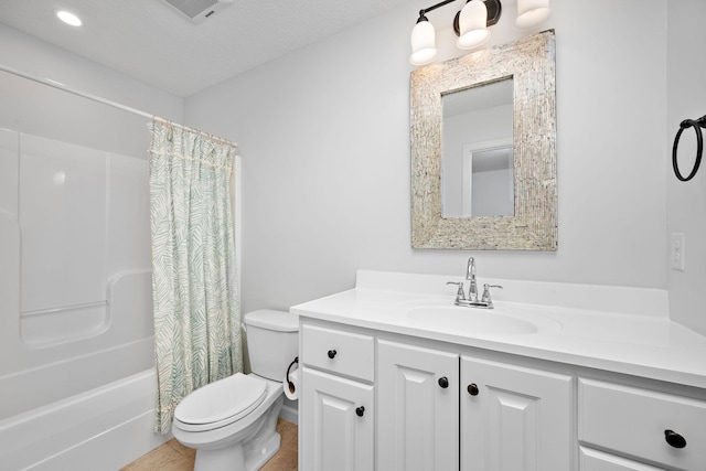 bathroom featuring visible vents, toilet, vanity, and shower / bath combination with curtain