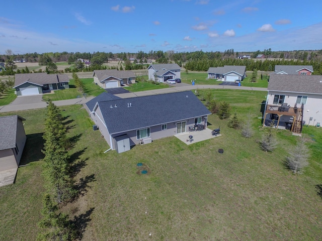 drone / aerial view featuring a residential view