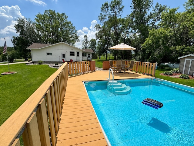 1001 1st Ave NW, Pelican Rapids, MN 56572 - swimming pool with a lawn, a deck, a shed, and outdoor dining space
