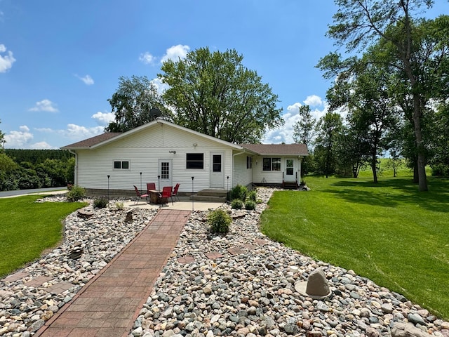 1001 1st Ave NW, Pelican Rapids, MN 56572 - back of property featuring a yard and a patio