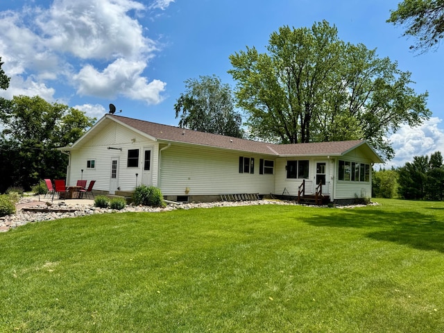 1001 1st Ave NW, Pelican Rapids, MN 56572 - back of property with a yard, a patio, and entry steps