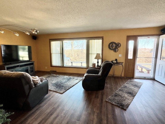 1001 1st Ave NW, Pelican Rapids, MN 56572 - living area featuring a textured ceiling and wood finished floors
